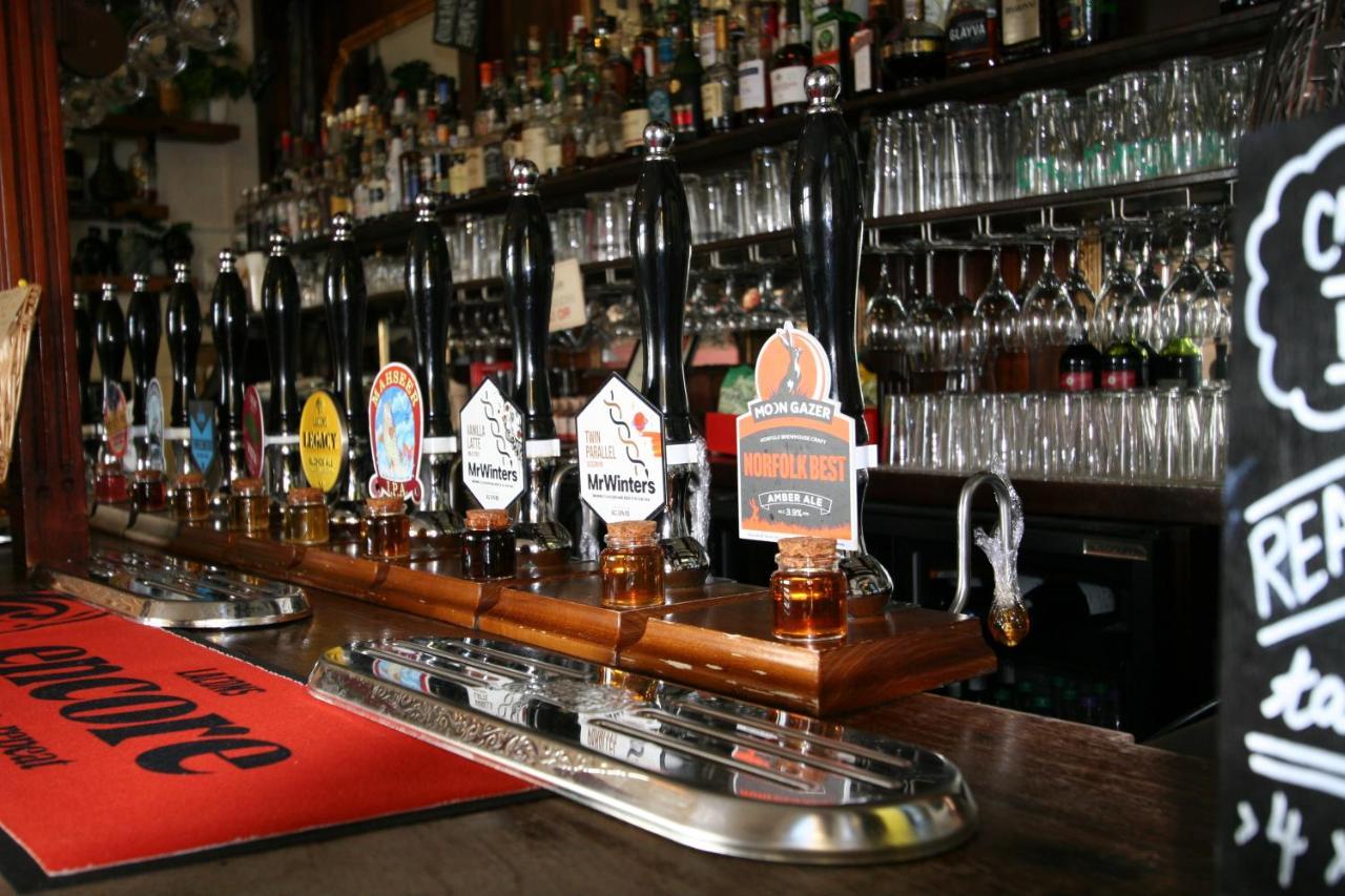 The Red Lion Hotel Cromer Exteriér fotografie Beer taps in a pub